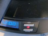 a digital clock on the side of a counter top