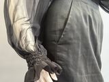 an image of a mannequin wearing a dress and gloves