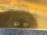an image of a close up of a metal object on a table
