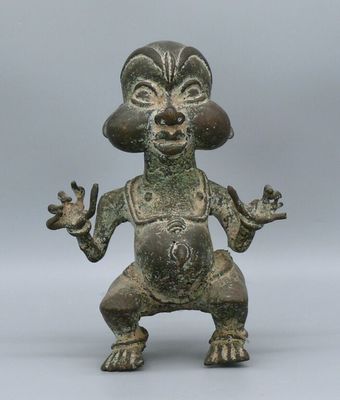 an image of a statue of a man with hands out