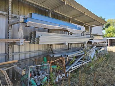 a lot of different types of metal and wood in the yard