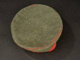 an image of a green hat with a red band