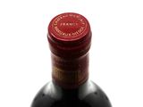 a bottle of wine that is sitting on a table