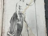 an old book with a drawing of a man holding a sword