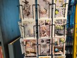 a display of cards on a rack in a store