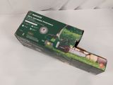 packaging of a lawn mower box on a white surface