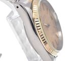 an image of a close up of a watch on a white surface