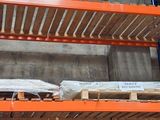 many pallets of boxes on the shelves in the warehouse