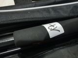 a sticker on the side of a black bag