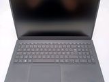 a close up of a laptop computer with a keyboard on it