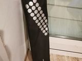 a remote control that is hanging on the wall