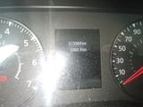 a close up of a car dashboard with a speedometer and gauges