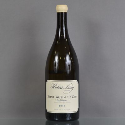 a bottle of wine that is sitting on a table