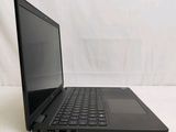 the laptop is sitting on a white surface with a white background