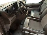 the interior of a car with a steering wheel and a dashboard