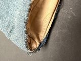 a close up of a piece of fabric with a hole in it