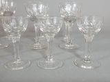 a lot of wine glasses sitting on a table