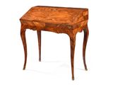 an old wooden table with a drawer on top of it