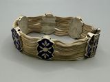 bracelet en argent orné de fleurs en émail bleu