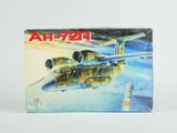 une image représentant une boîte contenant une maquette d'avion