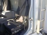 a white truck with a black seat and a black seat