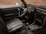 a black car with a steering wheel and a dashboard