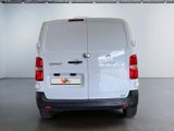a white van that is parked in a garage