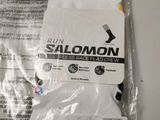 a bag of white socks that are on a table