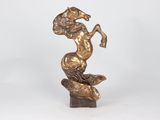 bronze statue of a horse with a rider on its back