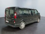 a black van that is parked in a room