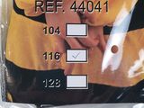 yellow hockey jersey with black and white stripes on the chest