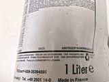 a close up of a can of water on a table