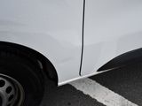 a close up of a car ' s side door with a sticker on it