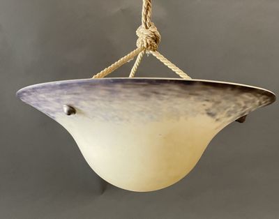 an image of a light fixture hanging from a rope