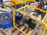 a yellow fire hydrant sitting on top of a pallet