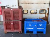 two plastic containers sitting next to each other in front of a building