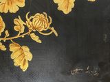 a picture of a painting of flowers and leaves on a black background