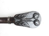 a close up of a cane handle with a design on it