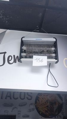 a sign that says ten on the side of a building