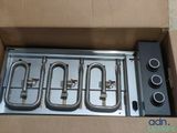 an image of a box with four burners inside of it