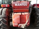 a tractor that is parked in a building