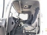 doorway view of a truck with the driver ' s seat up