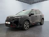 the new citrole suv is parked in a large room