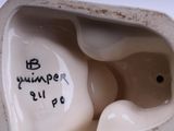a close up view of a ceramic figurine of an elephant