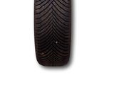 a close up of a tire on a white background