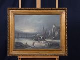 painting on easel of a painting of people on a beach