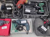 a lot of tools that are laying out on the floor