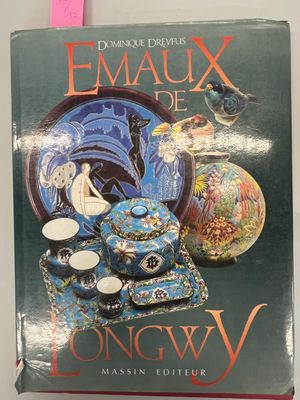 an image of a book with a picture of a vase and other items on it