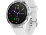 a close up of a smart watch with a white band