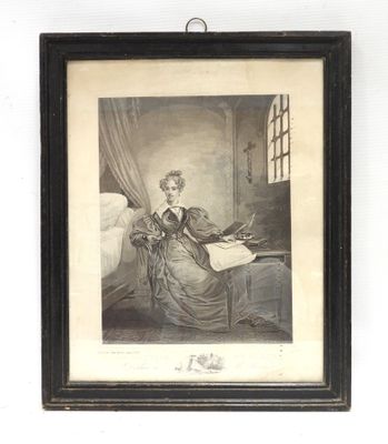 an old black and white picture of a woman sitting at a desk
